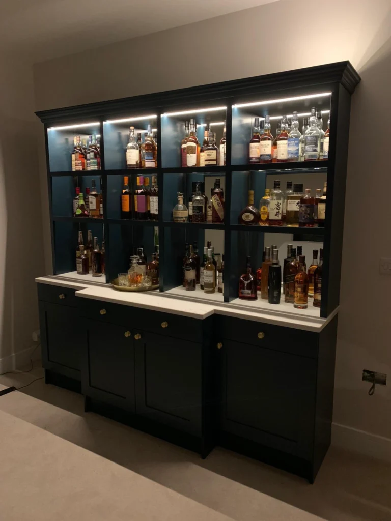 Breakfront Whiskey Fitted Bar and Wine storage unit with mirrors and lighting with a quartz top lit