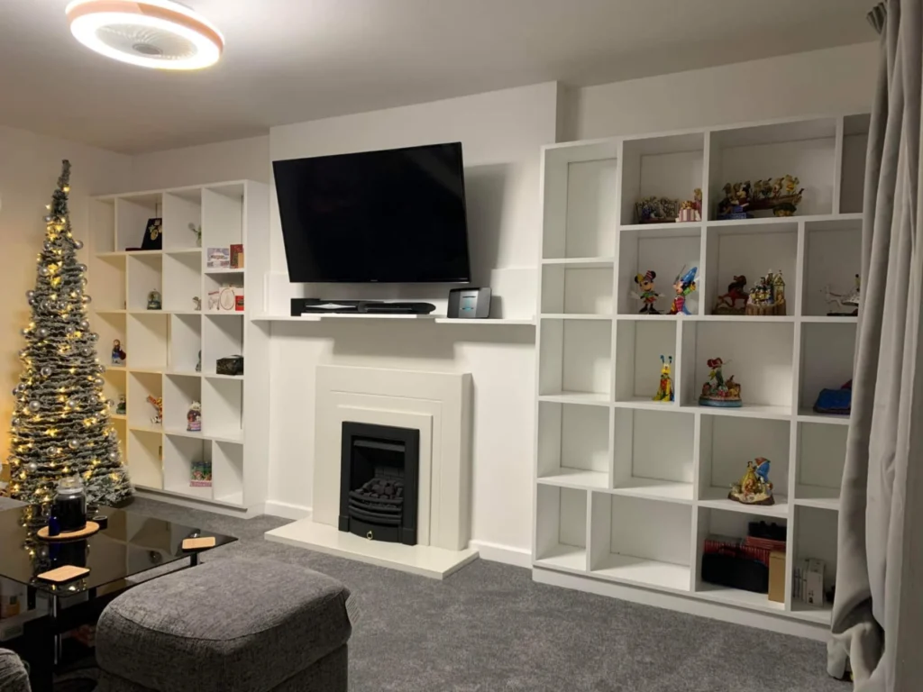 Modular alcove units painted in white with media section